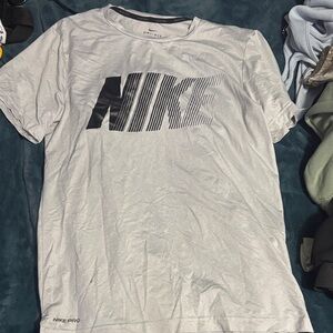Nike women’s White Short-Sleeve Dri-FIT Tee with Black Graphic